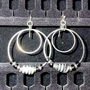 Dangling Zebra hoop earrings
